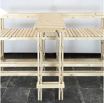 Park bench with table leaning on fence in Antwerp, Belgium